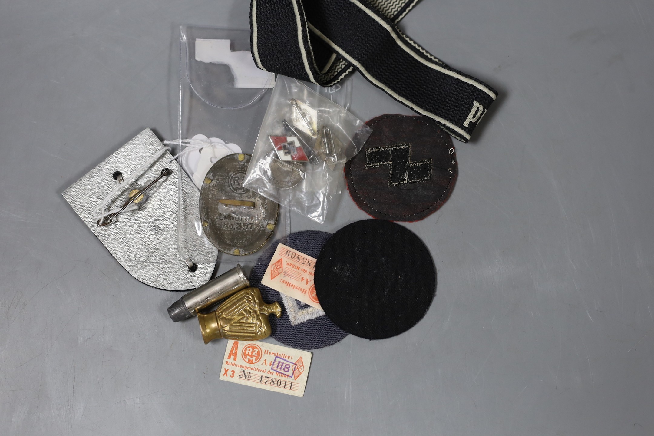 WWII German Third Reich badges, pins and ephemera including an SS badge